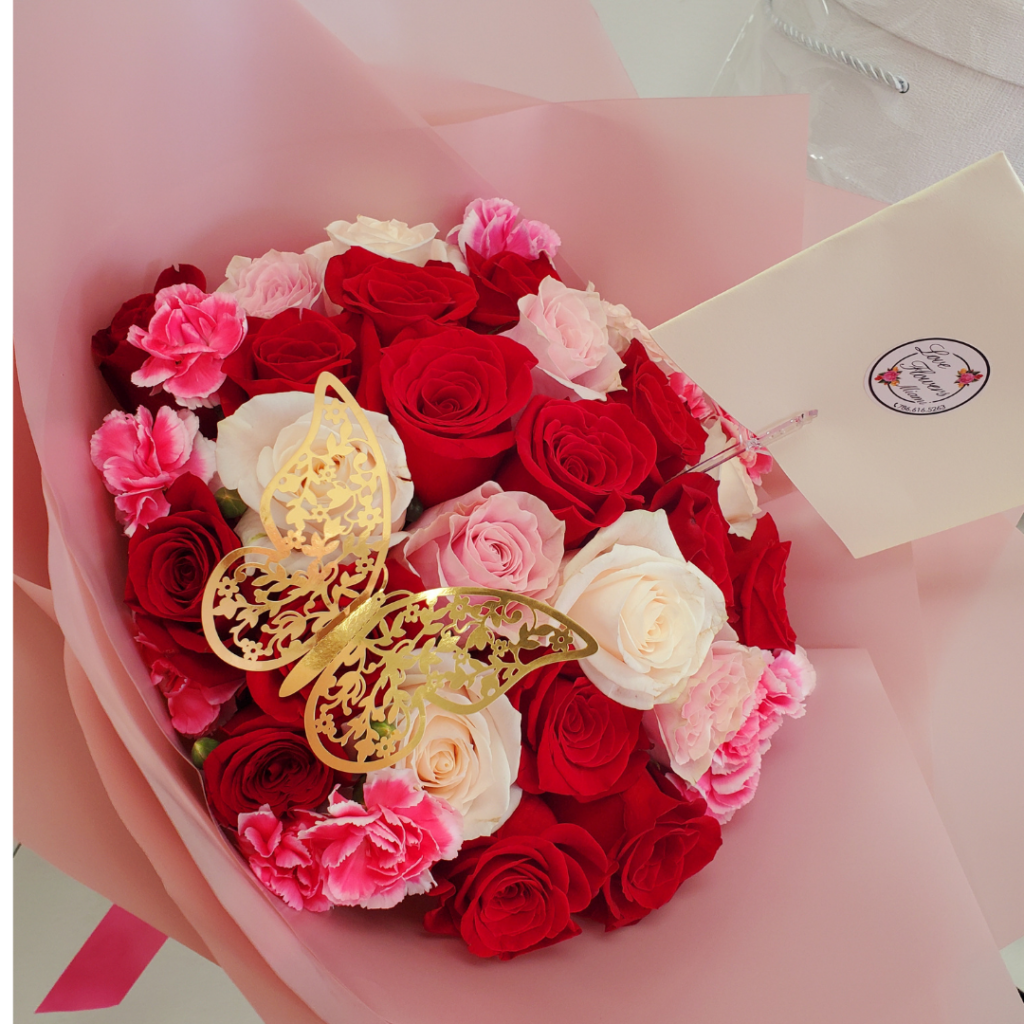 Beautiful bouquet of pink and white red roses