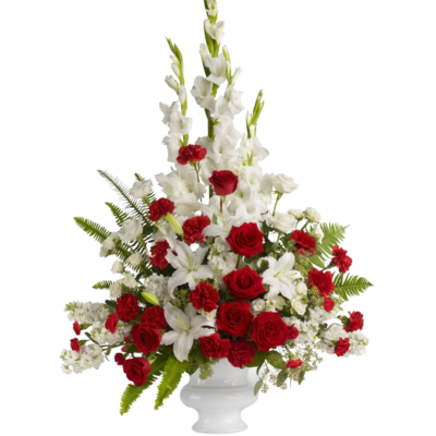 floral arrangement a combination of red and white roses plus orchid