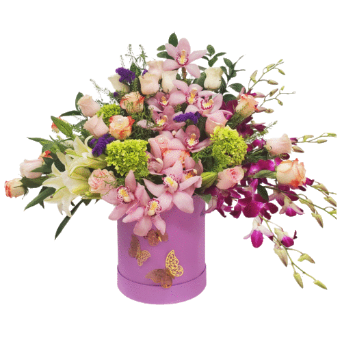 beautiful arrangement of orchids and blalnca roses and pink lilies and many more.