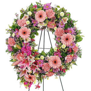 pink crown with variety of flowers, lilies atromelia pink gervera white buttons and more