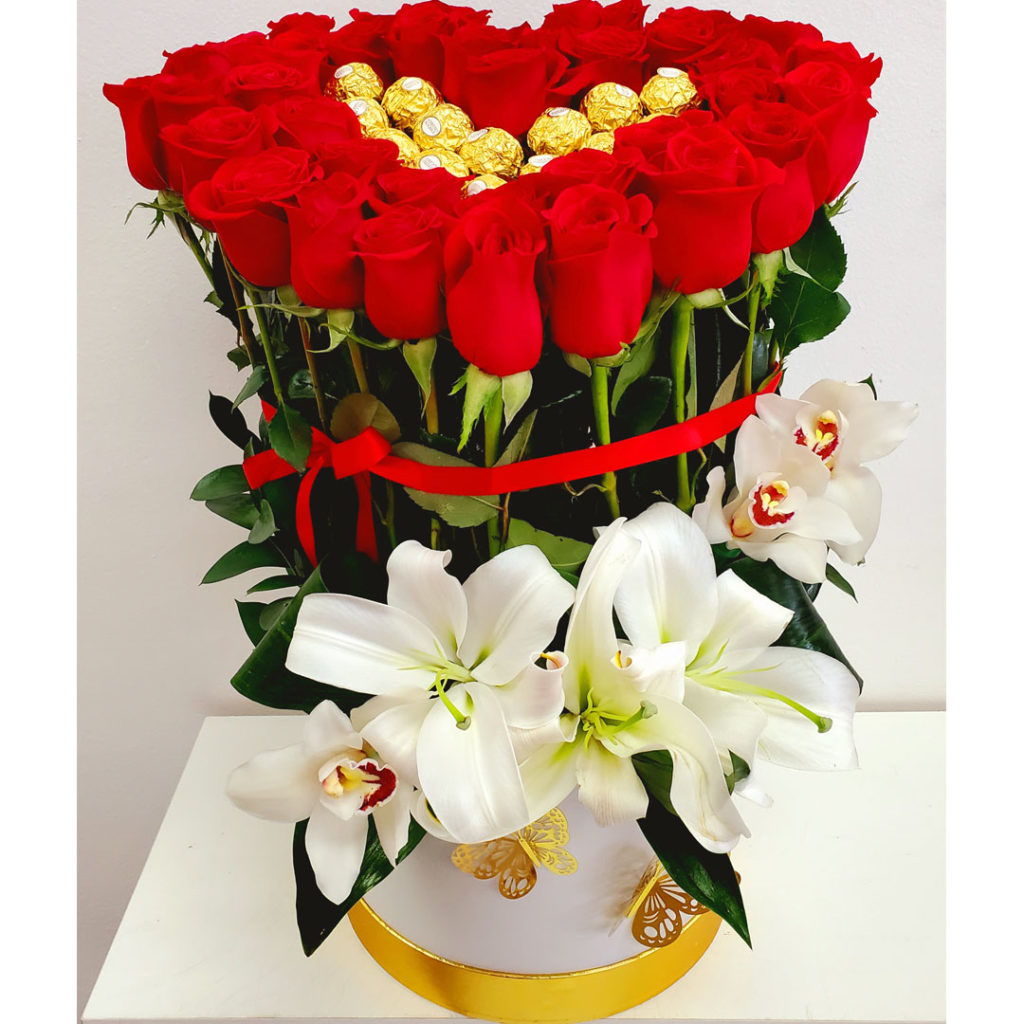 Luxurious-flower-arrangement-red-roses-lilies-orchids