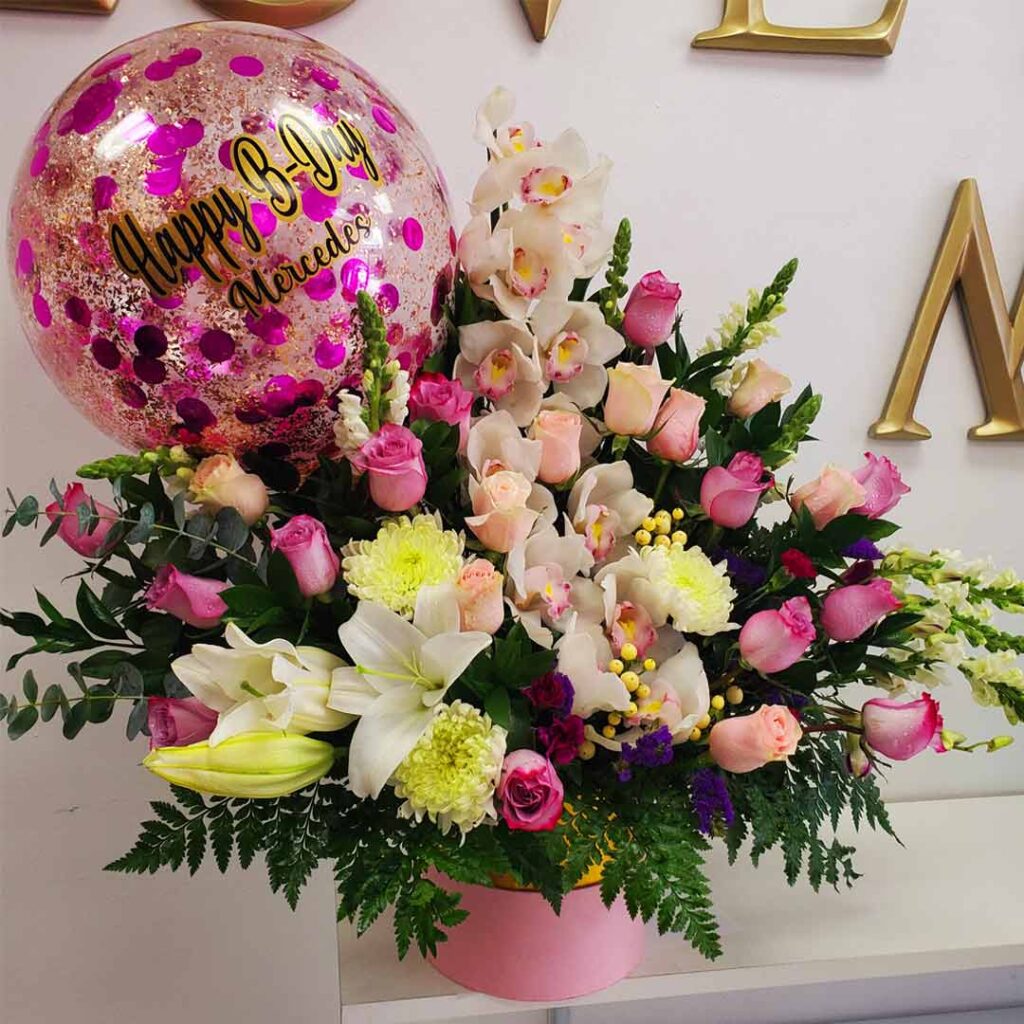 Happy Birthday-Flower-Arrangement-with-roses-orchids-and-lilies, and a personalized balloon