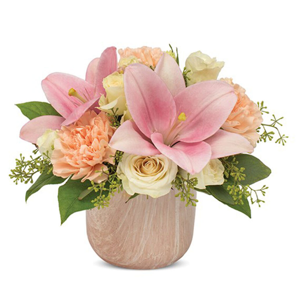 A beautiful bouquet of Asiatic lilies, carnations, spray roses and seeded eucalyptus
