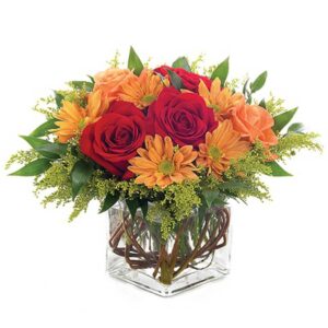 This stunning arrangement featuring roses, daisies, solidago, Italian ruscus and curly willow