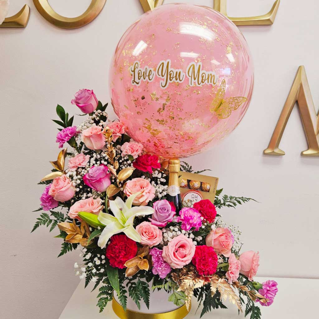 Pink-roses-and-ballons-flower-arrangement